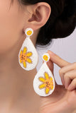 Hand done Teardrop flower seed bead earrings