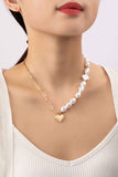 Asymmetric pearl & chain necklace with puffy heart